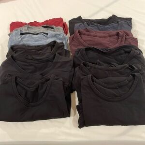 12x (dozen) lululemon workout t-shirts in good condition.